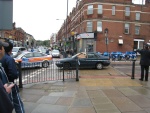 Steal car; Run over policeman; Met Police close the road.